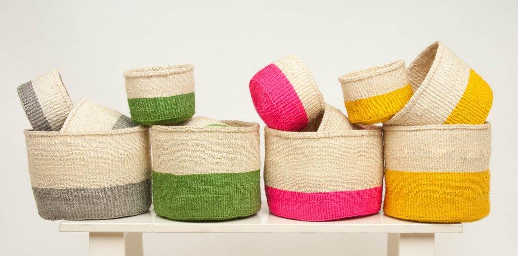 COLOUR BLOCK (KENYA) Hand woven from sisal grass (and some from banana leaf fibres) in three different sizes, these round storage baskets can