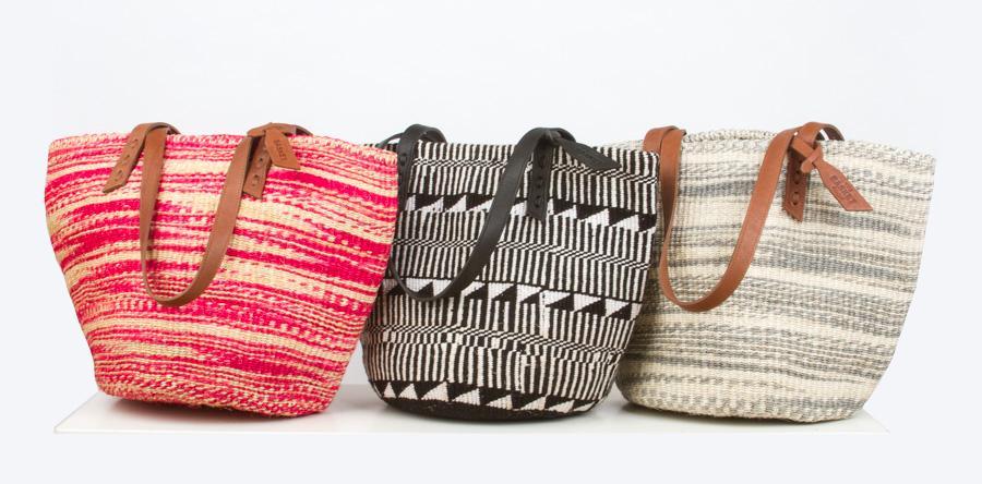 BASKET BAGS (KENYA) Inspired by tribal patterns and hand woven by members of the Kamba tribe, each basket bag takes up to six days to complete before