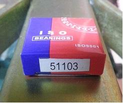 Slide the supplied thrust bearing marked 51103 over the