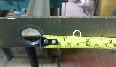 Measure 35mm from the wall of the centre hole to the left