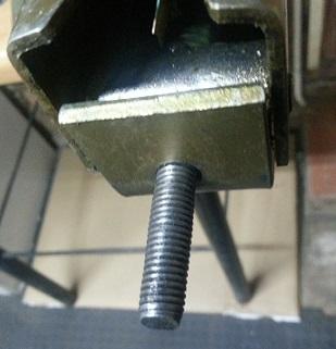 Re- install the removed L- bracket from the