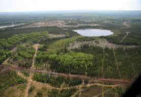 A mix of boreal forests dominates the landscape interspersed with lakes, ponds, marshes, swamps, bogs, and fens.