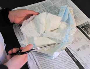 Creating Snow The following items will be required for the prep of this activity: diaper scissors resealable sandwich bag