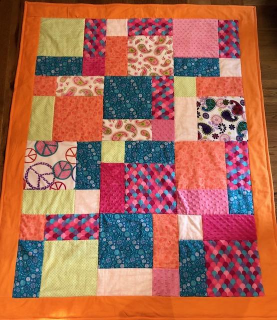 Soronny presented her StoryTime Quilts 4 Kids Gold Award Project at our September meeting.