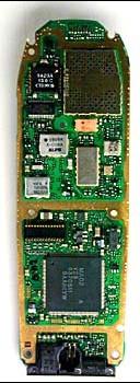 Here is one from a typical Nokia digital phone: The front and back of the circuit board In the photos above, you see several computer