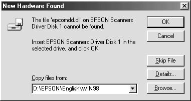 When a message appears to prompt you to insert the scanner software CD-ROM, insert the CD-ROM in the CD-ROM drive, and then click OK.