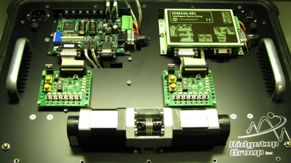 The position servo drive installed on the left side of the top panel has been retrofitted with sockets to enable insertion and removal of individual metal oxide semiconductor field-effect transistor