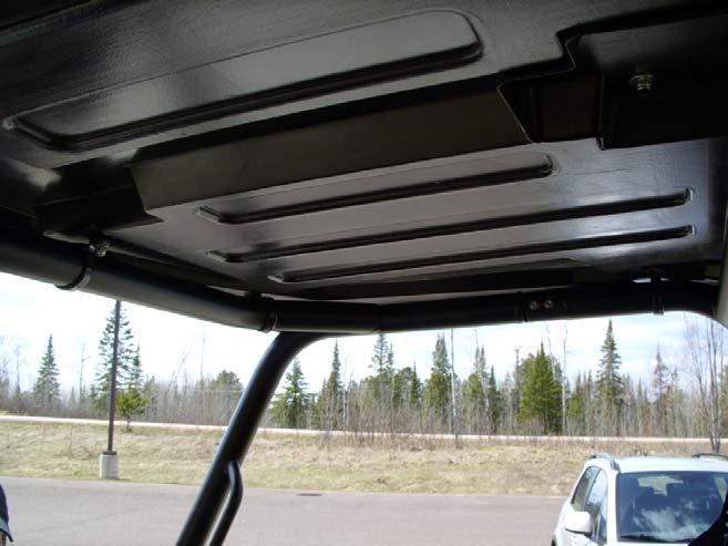 8) Using a knife or scissors cut the H molding off flush with the roof edge. See photo below Mounting Your Roof 9) Place the assembled roof on top of your 2010 or newer Polaris Ranger Crew.