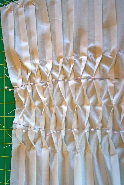 17. Stitch through the center of each waved row of tucks, following your pin points,