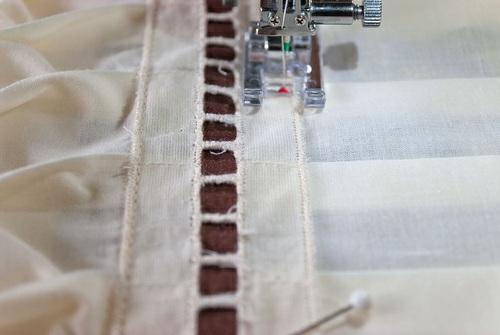 3. Stitch each strip in place along each long side. 4. Trim the excess flush with the main panel. 5.