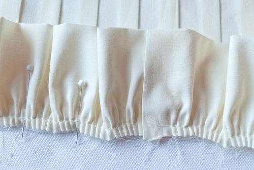 8. Carefully pull the ruffle away from the front