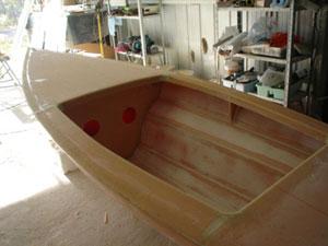 A plywood mast support was added and a hole cut in the hull