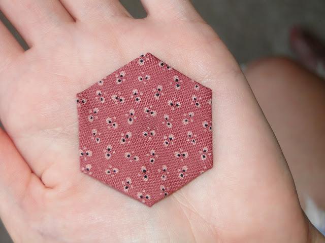 One down...that wasn't too hard, was it? They are just too cute! You may feel all thumbs at first, but hang in there!! The thread will get caught on the corners of the hexagon or the pin.