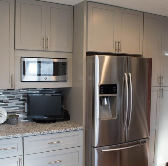 with our crisp white Aspen cabinets for a sleek, modern look.