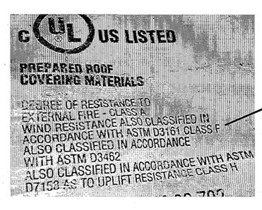 To verify code compliance, check the wind resistance classification printed on the packaged bundle of roof covering material. The example the right is Class F; it is acceptable.