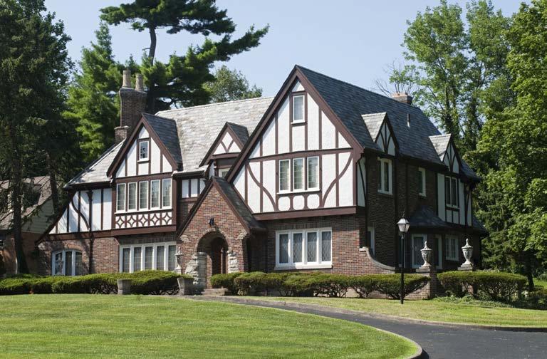 Tudor Your Tudor home has: Decorative half-timbering that mimics medieval European homes A steep roof An embellished