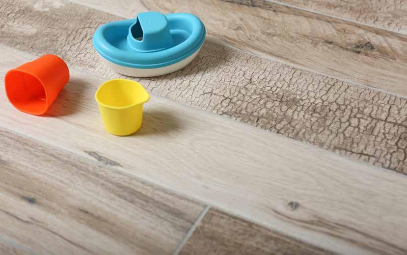 SNUG Great for modern, vintage or retro chic, the Snug tile brings together the colours of rock, wood, anthracite and cement for a truly mix-and-match floor covering that s the best of all worlds.