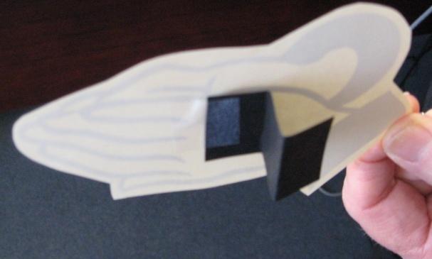 7. Younger children Fan fold the black strip of paper and tape, staple or glue stick strip to praying hands picture 8.