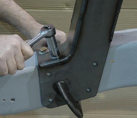 Use C-clamps to securely hold the sides and rear of the step notch without covering the premade holes.