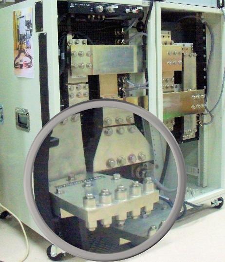 In competitive products the power supplies must be turned off, then compressed gas used to drive an external mechanical switch to change the polarity, then the power supplies must be turned back on;