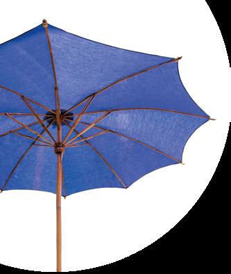 DREAMING OF A SEASIDE HOLIDAY Wooden parasol with a canvas canopy in