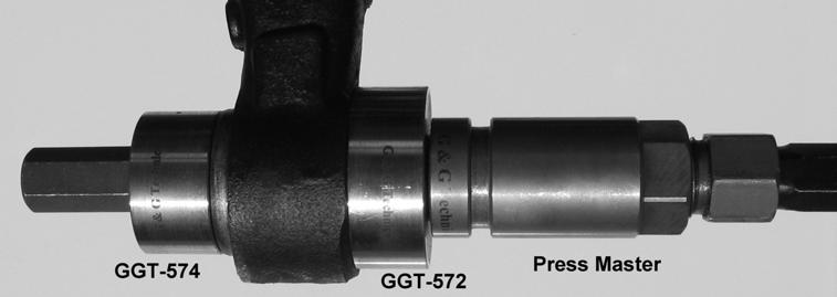Ford Lower Rose Joint Install: Remove the boots from the new Rose Joints; fit the Rose Joint onto the GGT-570 threaded rod with the correct adaptors as shown below.
