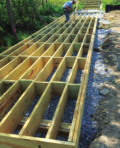 Curtis Lumber, provided for unloading the approximately 25,000 board feet of 2x12 framing lumber and 5/4x6 decking, as part of the purchase agreement.