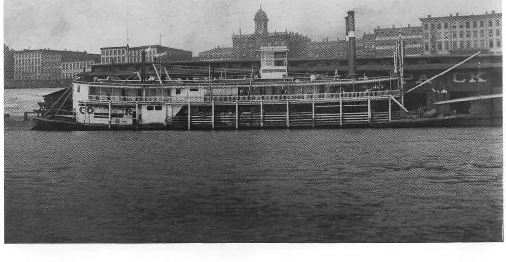 About 1900 the Courier was docked at a wharfboat.