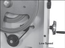 As shown in Fig. 13. For the low speed (1510 ft/min), the belt should be fitted to the front pulley on both the motor and wheel. As shown in Fig. 13. To properly adjust belt tension, turn hand-wheel (D--Fig.