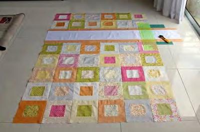 Then lay it out next to your quilt and cut away the excess fabric.