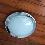 ceiling fitting with a glass cover.