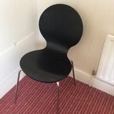 922604123960633 Chair Metal legs and black wooden seat.