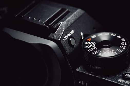 The metering dial sits neatly below the shutter speed dial, and the drive dial is below the ISO sensitivity.