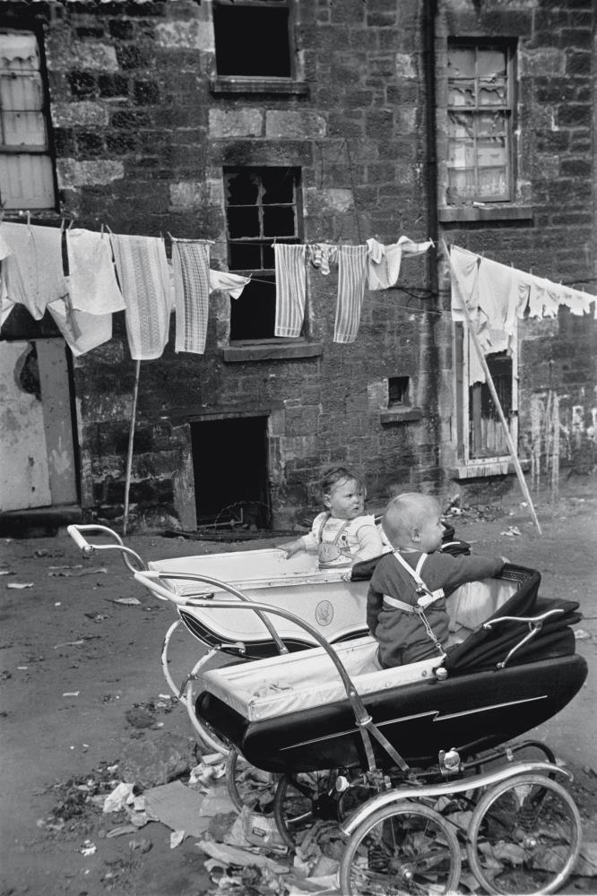 David Peat, Untitled,1968 Scottish National Portrait Gallery The Peat Family These children are trapped in place by their safety harnesses, four wheels and a comfy carriage but unable to go anywhere