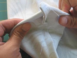 Basically, you feel for your seams: the side seam of your tote, which should be on top (between my thumbs in the