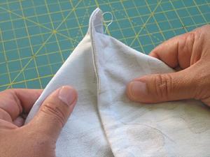 Simply move the fabric around feeling with your fingers until the seams are lined up on top each other and there s a