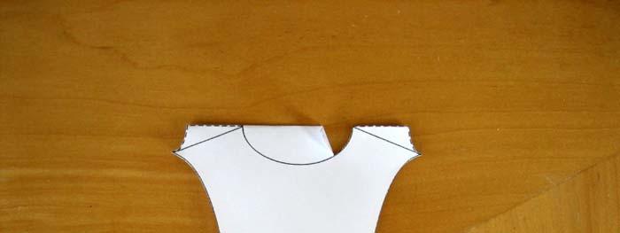 6. Fold the template in half along the dotted line.