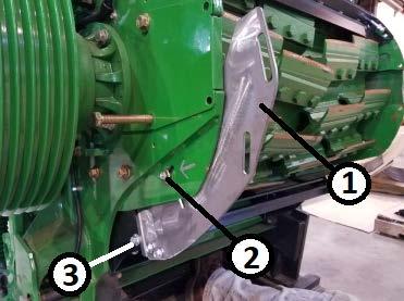 Install at pivot bushing to the spiral band. Tighten hardware finger-tight. See Figure 5.