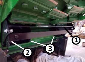 See Figures 1 and 2. Figure 1. Rear Sheet Removal Key 1 Sheet Key 2 Hardware Retain all hardware. Clean area of any trash or material accumulation. Install new spiral band using existing M12 bolts.