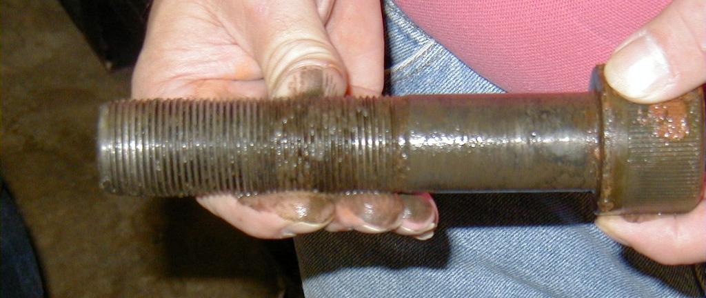 In this case of a loose roll, the bolt threads were deformed the last 1/2 indicating the holes were not tapped deep