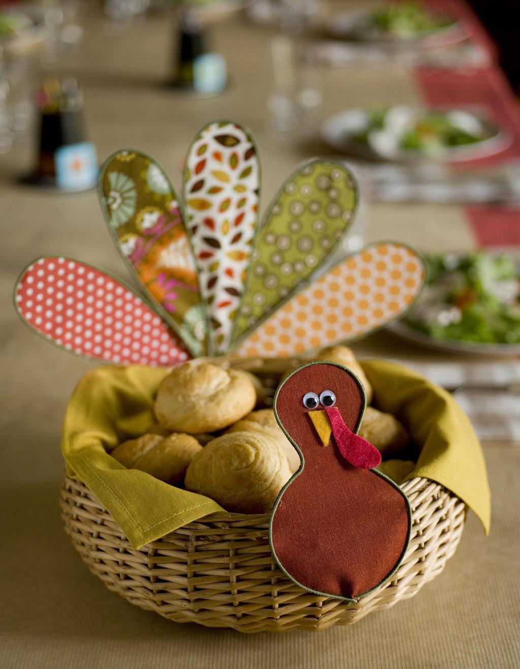 turkey basket This bird s pretty plumage adds a colorful touch to a functional centerpiece. 1. For each feather, bend a 22-gauge floral stem wire stem in half and twist the ends together as shown.