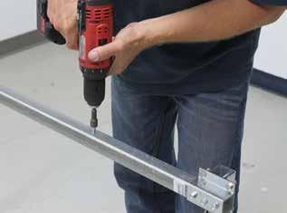 Install one FA4482B Tek screw at each point marked on the