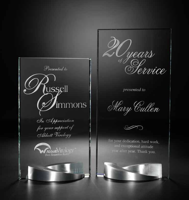 Metal & Glass Awards Cast metal bases hold hand-cut glass reflecting a spectrum of light to surround 9900.