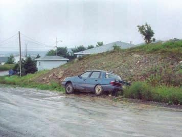 14. Surface photograph of Job s Road showing motor vehicle which was abandoned by Dr.