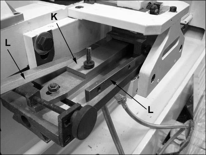 Install thrust bearing (E), washer, and both round nuts (A).