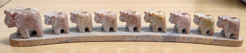 00 Add elegance to your Chanukah table with this menorah made from soapstone, featuring 9 elephants. Size: 19 x 1.