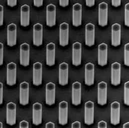 Then, electron beam lithography (EBL) was used to produce a pattern formed by circles arranged in a hexagonal array.