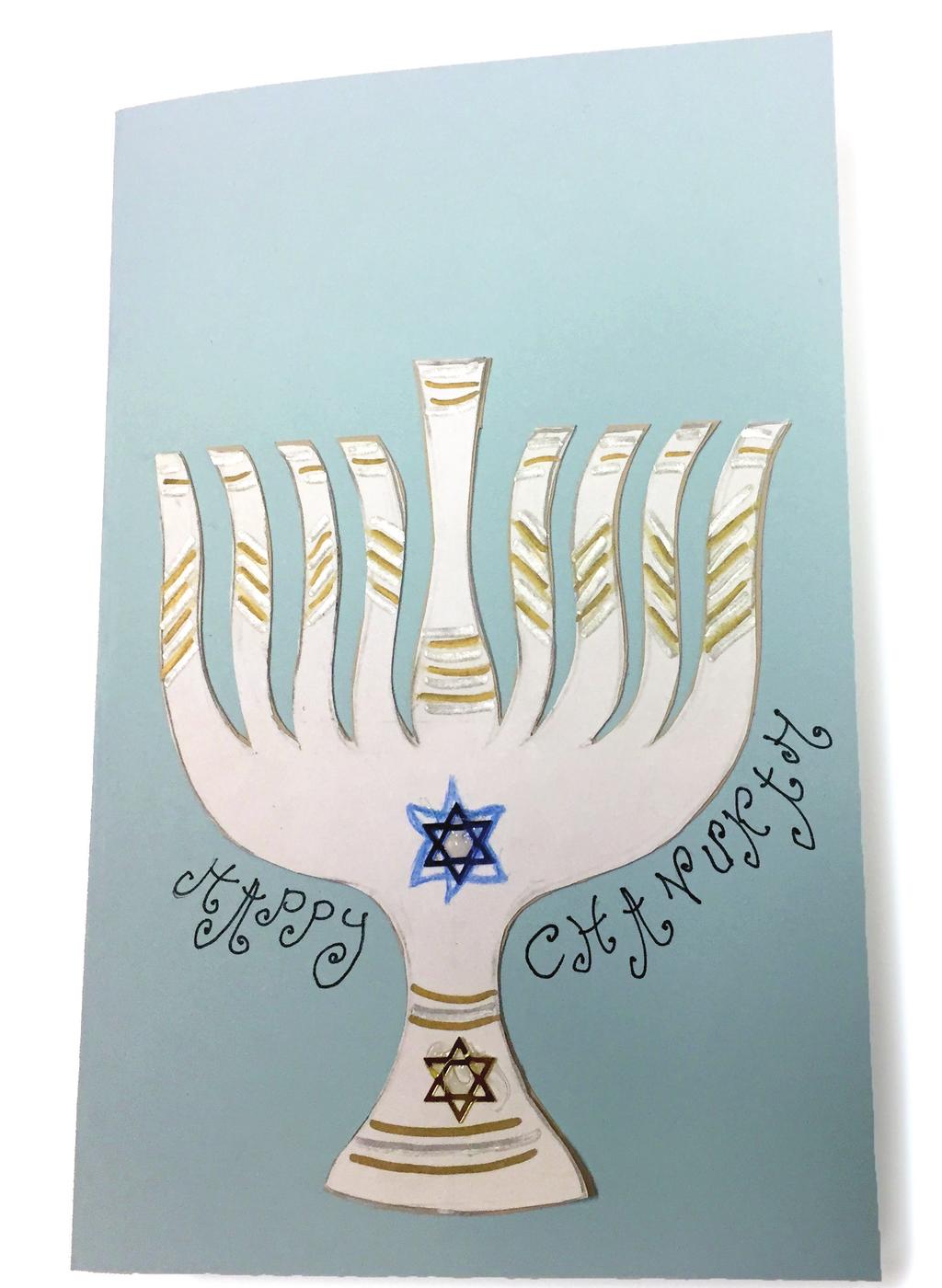 If you cut carefully, you will get two images: a positive image (the menorah), and a negative space which is the reverse image the menorah - Keep both if you can 4. Color the menorah 5.