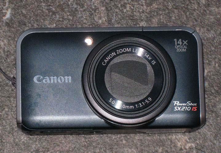 Canon PowerShot Unlike the Ixus the lens does not retract completely flush with the body - when closed a small rim remains but that is not a big problem when you consider the 14 x optical zoom lens.