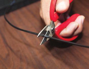 Step 1 - Fiber Scissors Cleanly cut the fiber cable with fiber scissors.